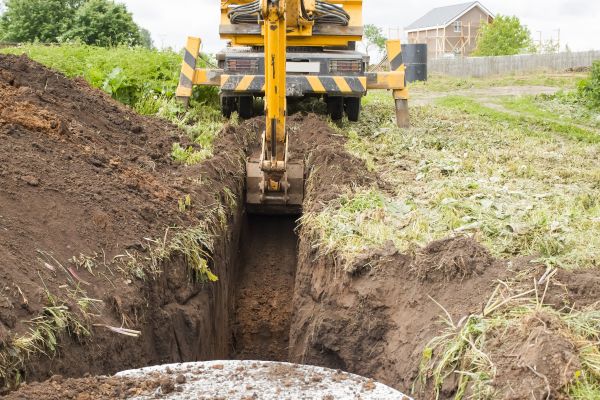 Drainage Trench Installation in Hayden